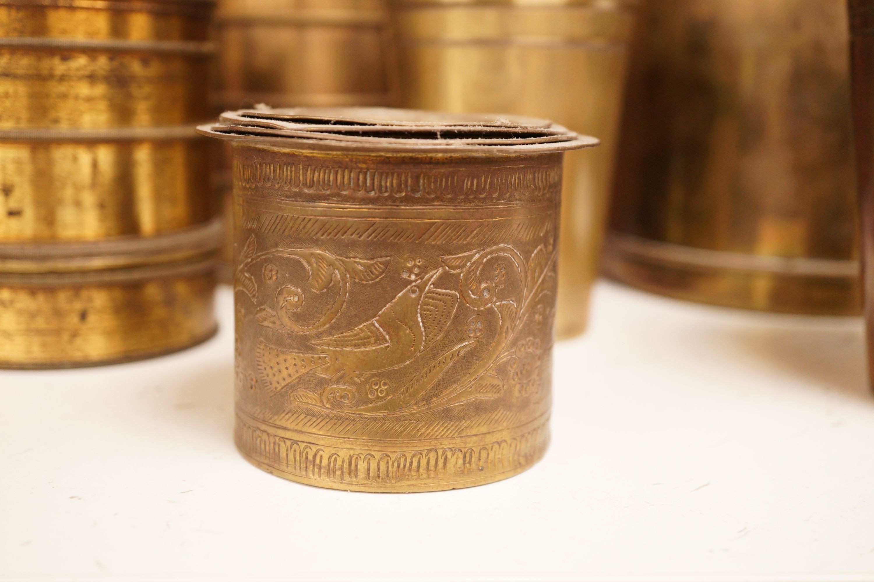 A collection of Tombee metalworks and other graduating measures, French examples etc